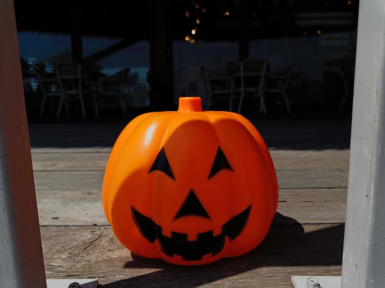 Angry face orange pumpkin for Halloween. photo