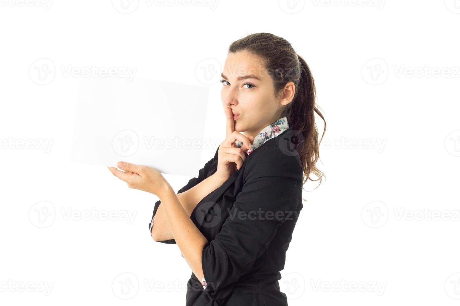 woman in uniform with white placard in hands photo