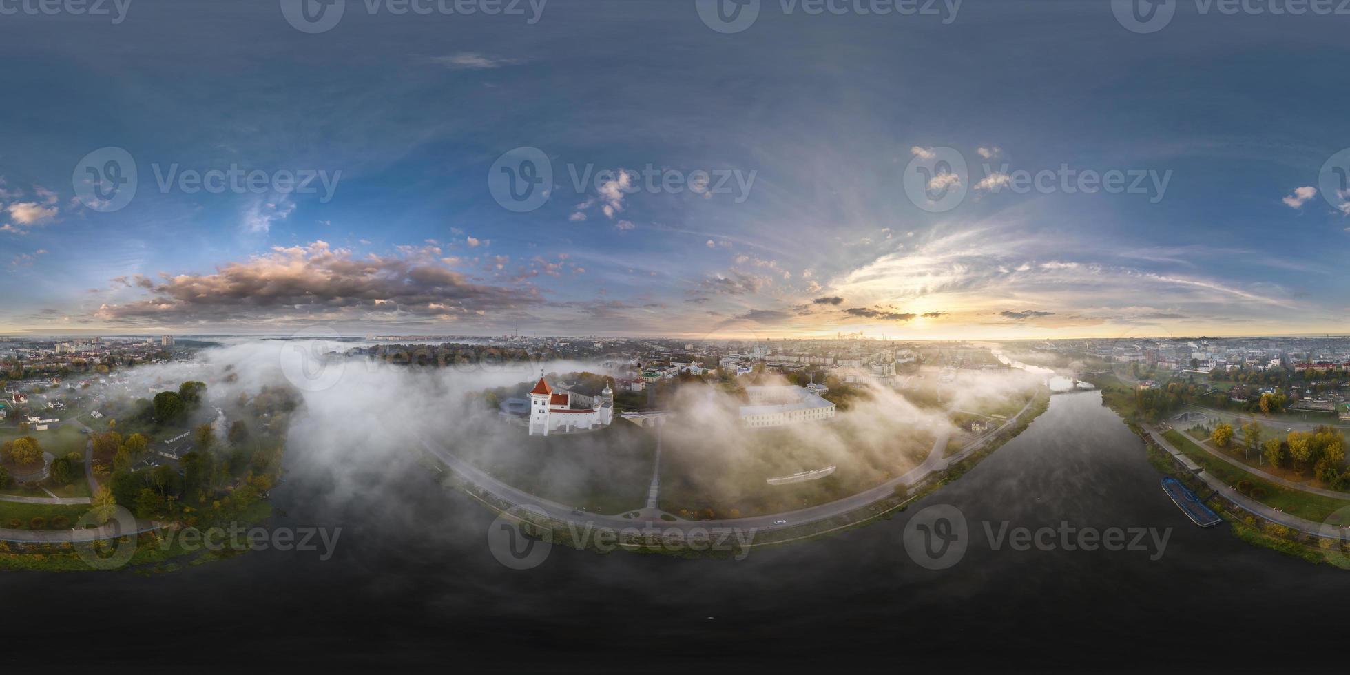full hdri 360 panorama of earlier foggy morning and aerial view on medieval castle and promenade overlooking the old city and historic buildings near wide river in equirectangular projection photo
