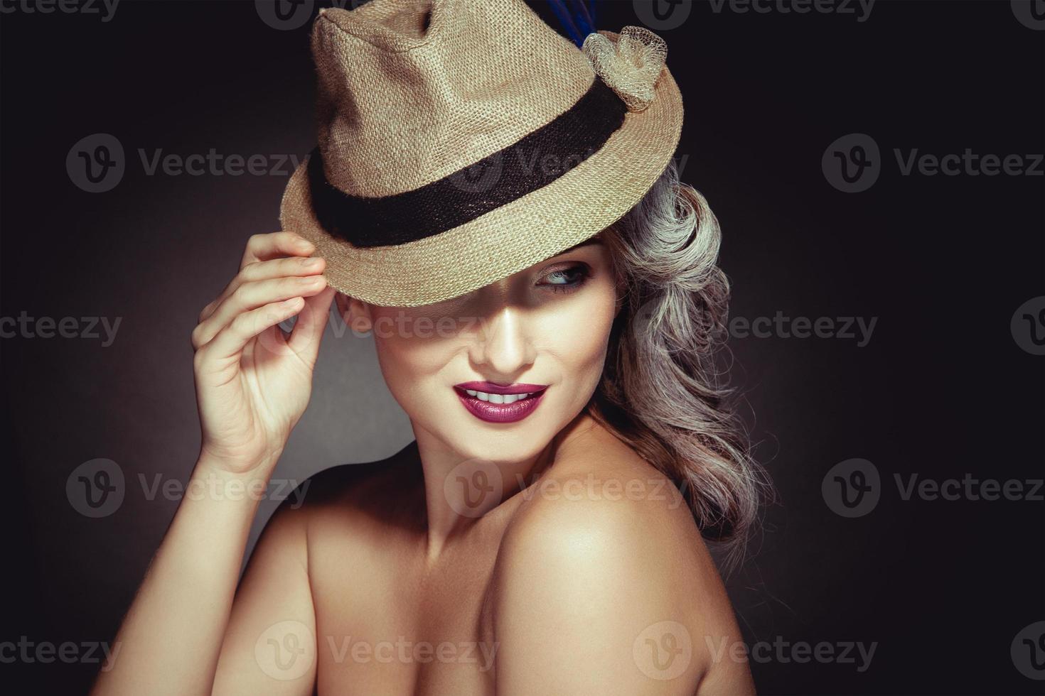 Sensual portrait of cutie adult woman with greay hair color and beautiful makeup in hat photo