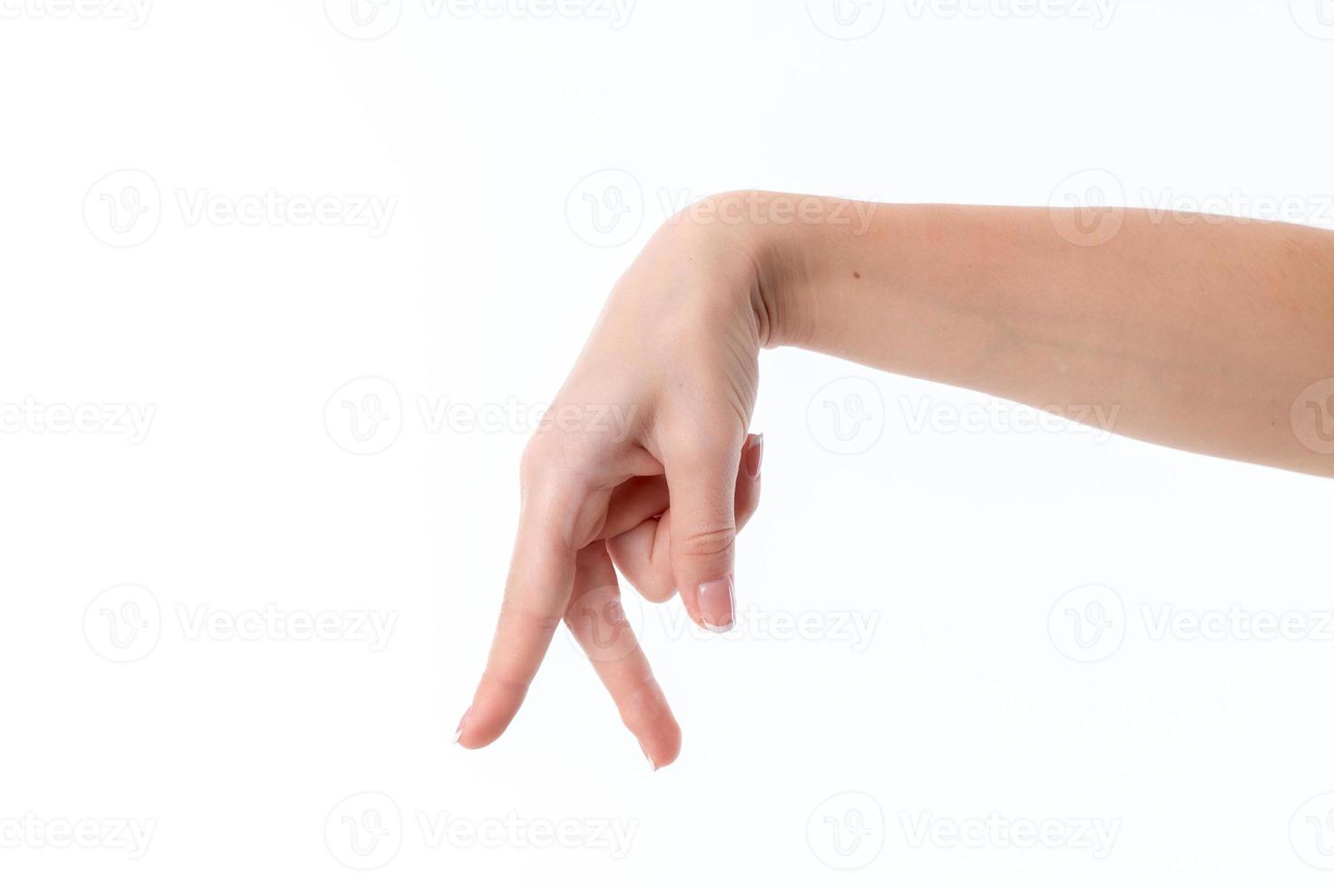 female hand showing the gesture with two fingers down  isolated on white background photo