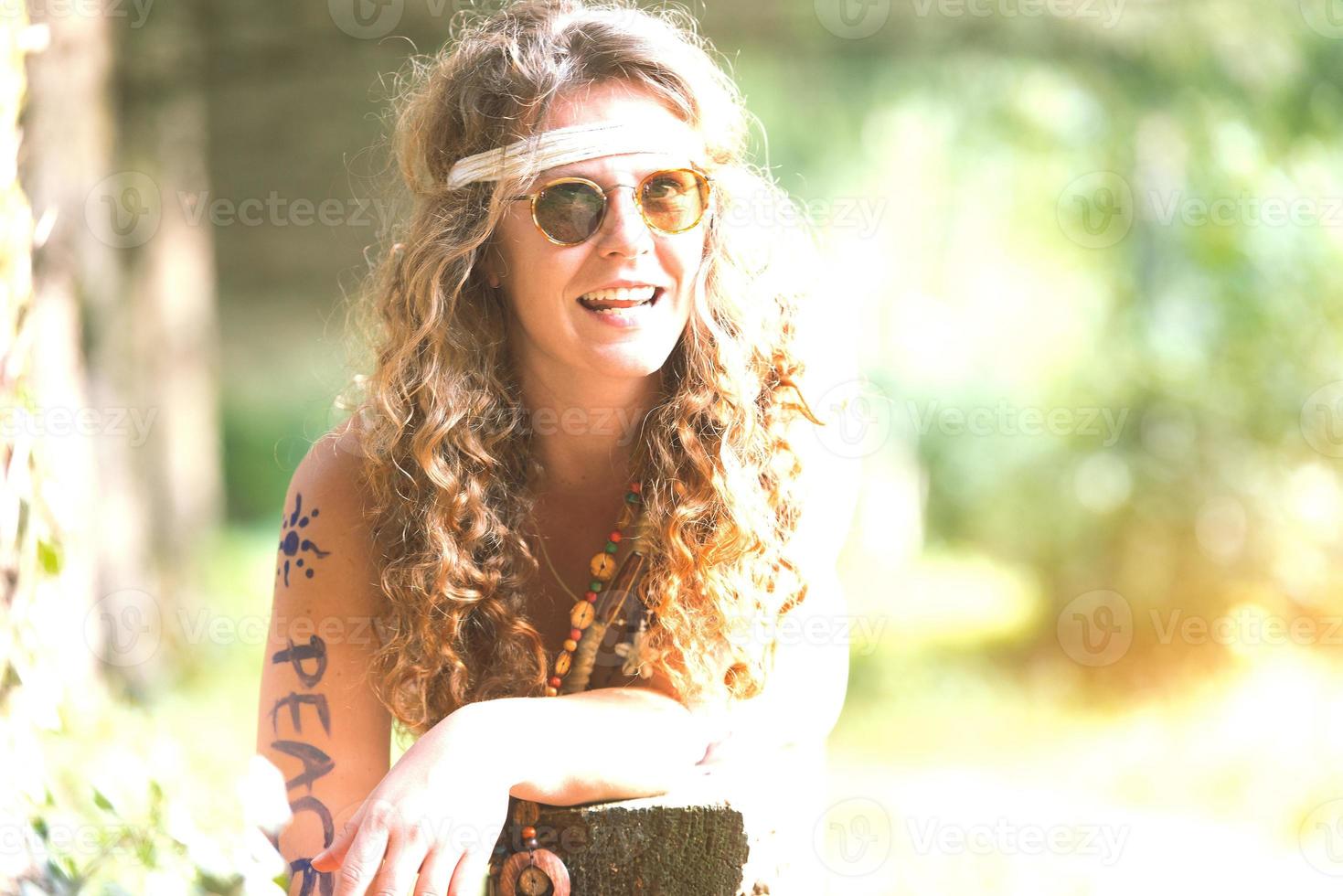 Pretty free hippie girl. Peace. Body painting. - Vintage photo effect