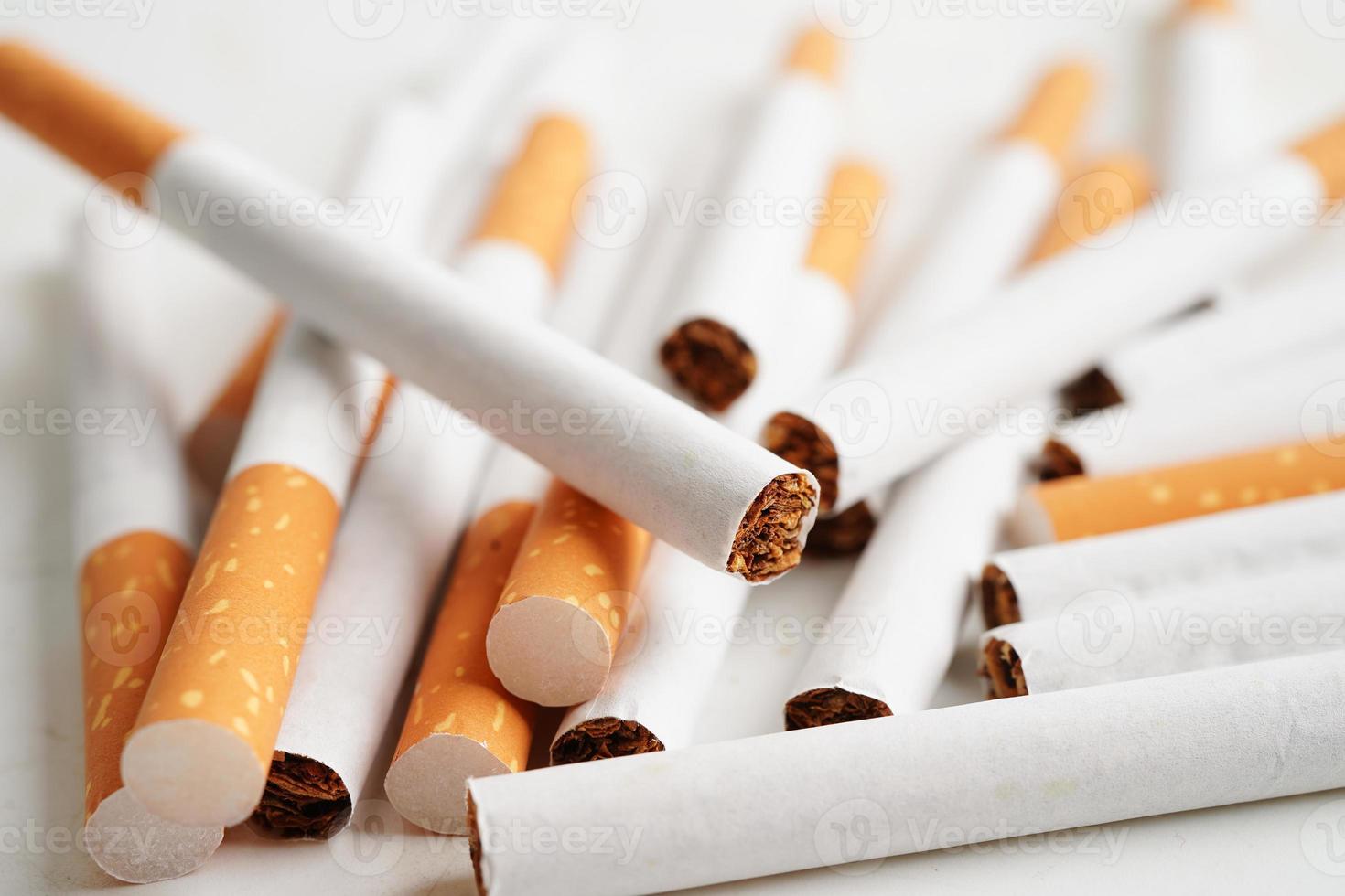 Cigarette, roll tobacco in paper with filter tube, No smoking concept. photo