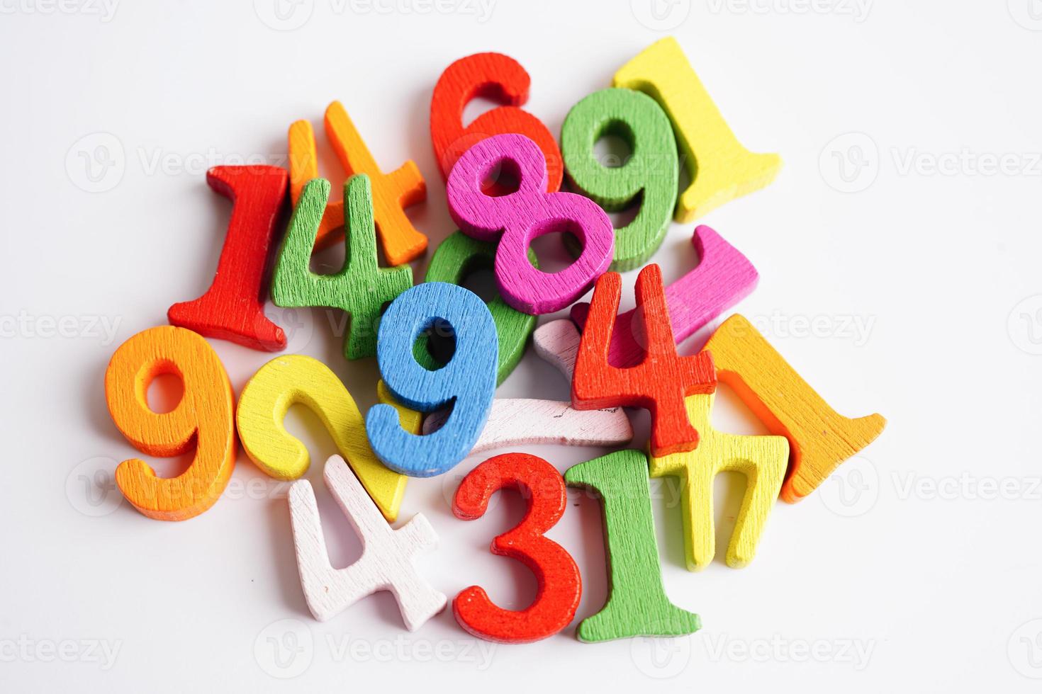 Number wood block cubes for learning Mathematic, education math concept. photo