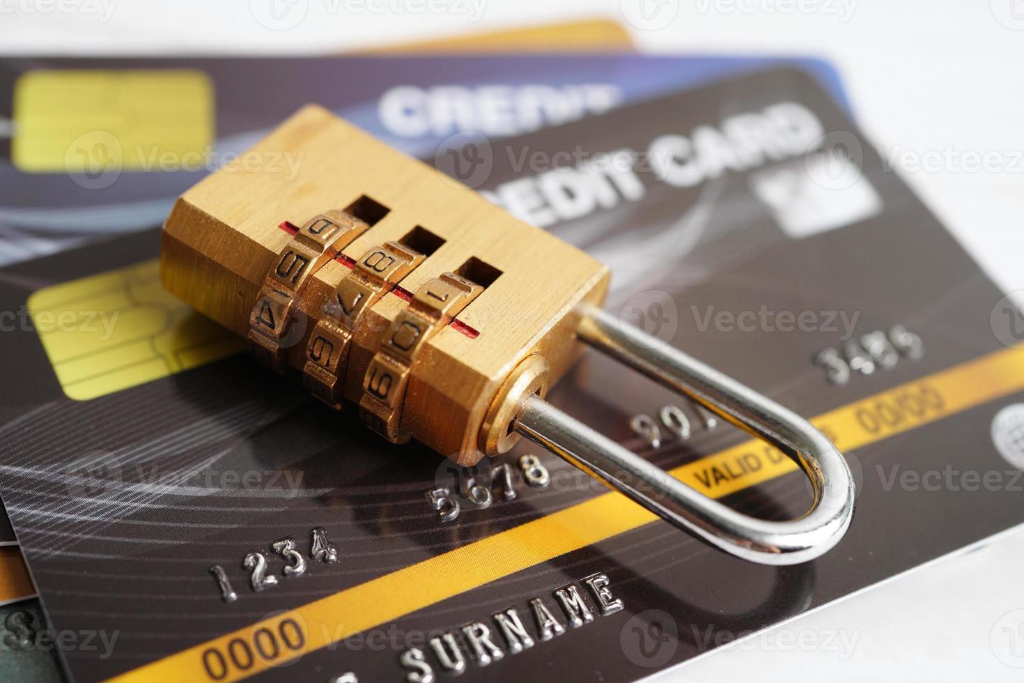 Credit card with password key lock, security finance business concept. photo