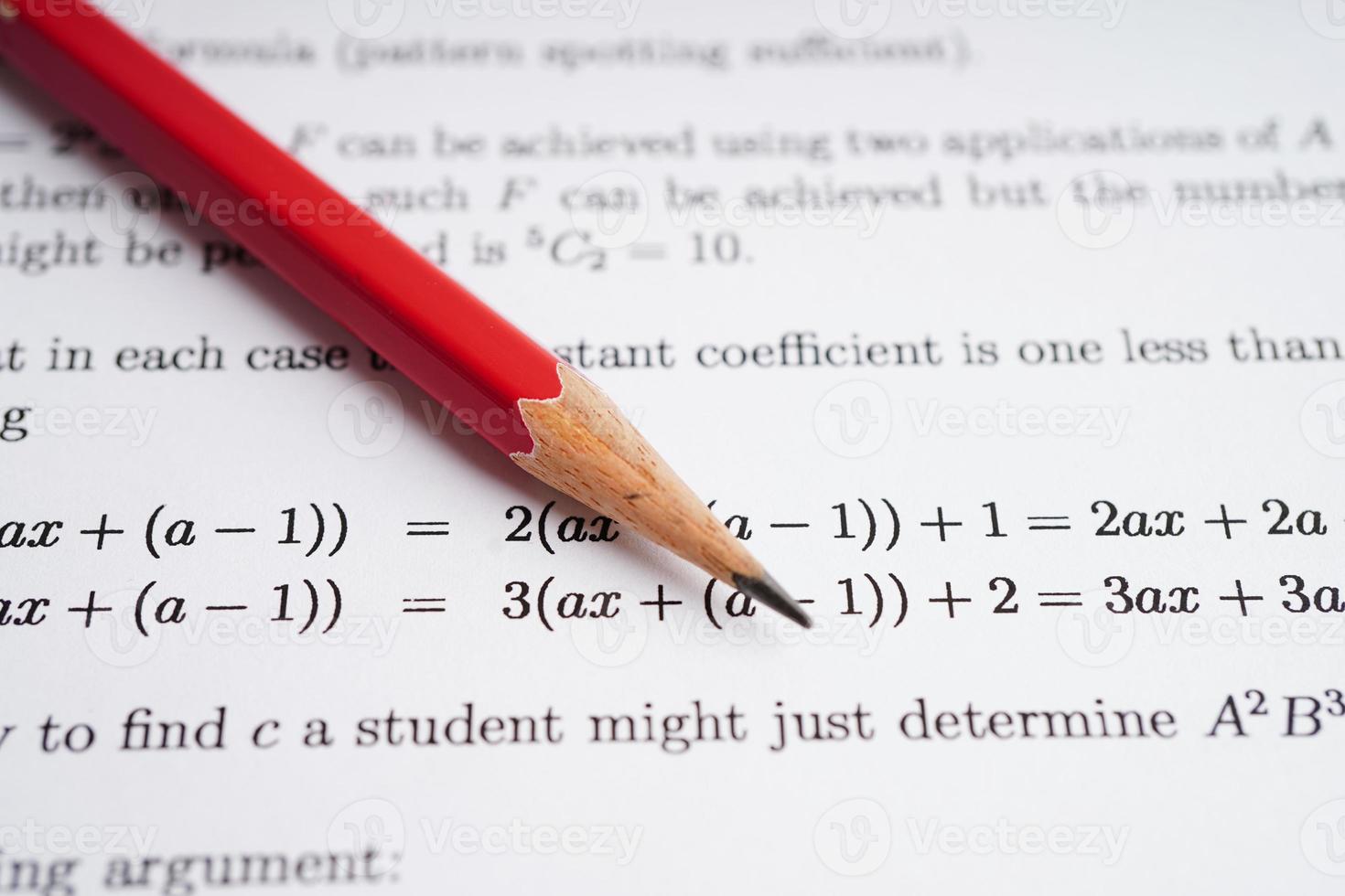 Pencil on mathematic formula exercise test paper in education school. photo