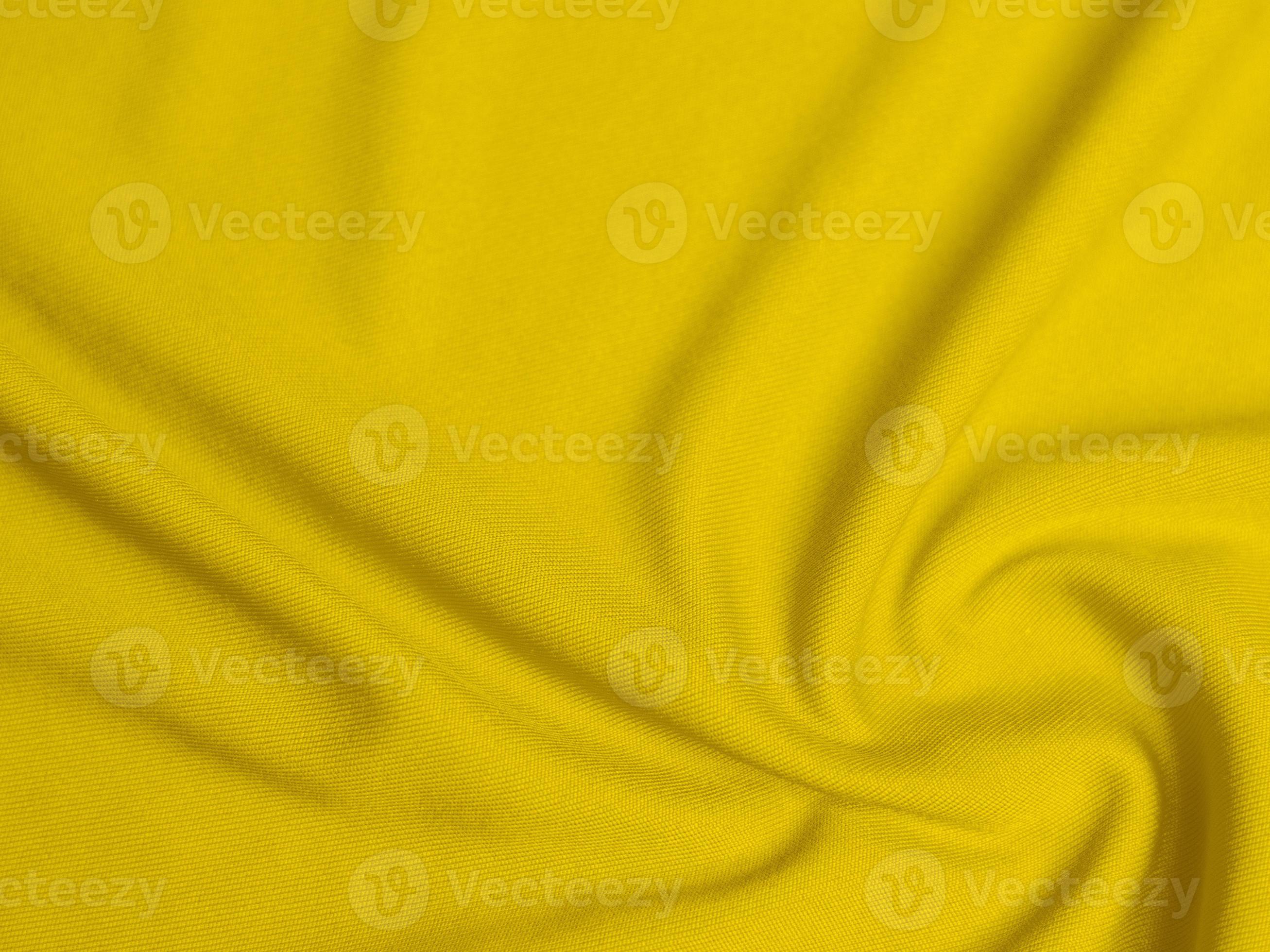 yellow velvet fabric texture used as background. Empty yellow fabric