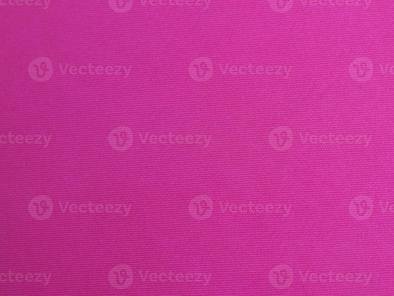 Pink velvet fabric texture used as background. Empty pink  fabric background of soft and smooth textile material. There is space for text photo