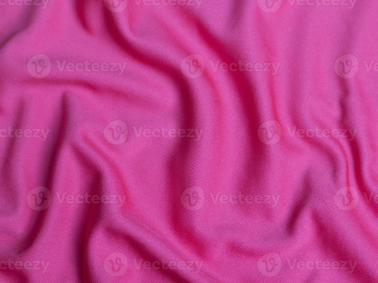Pink velvet fabric texture used as background. Empty pink  fabric background of soft and smooth textile material. There is space for text photo