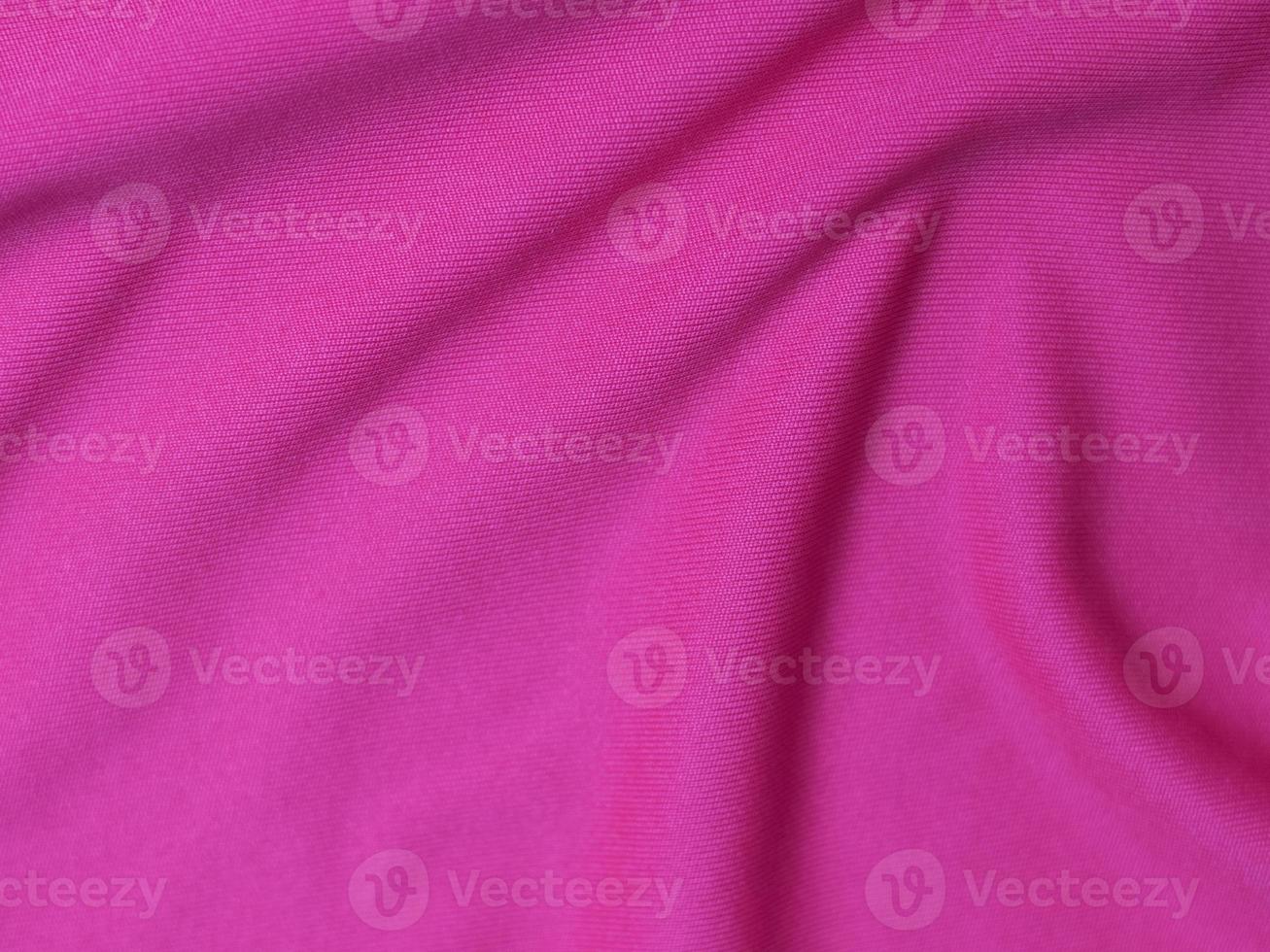 Pink velvet fabric texture used as background. Empty pink  fabric background of soft and smooth textile material. There is space for text photo