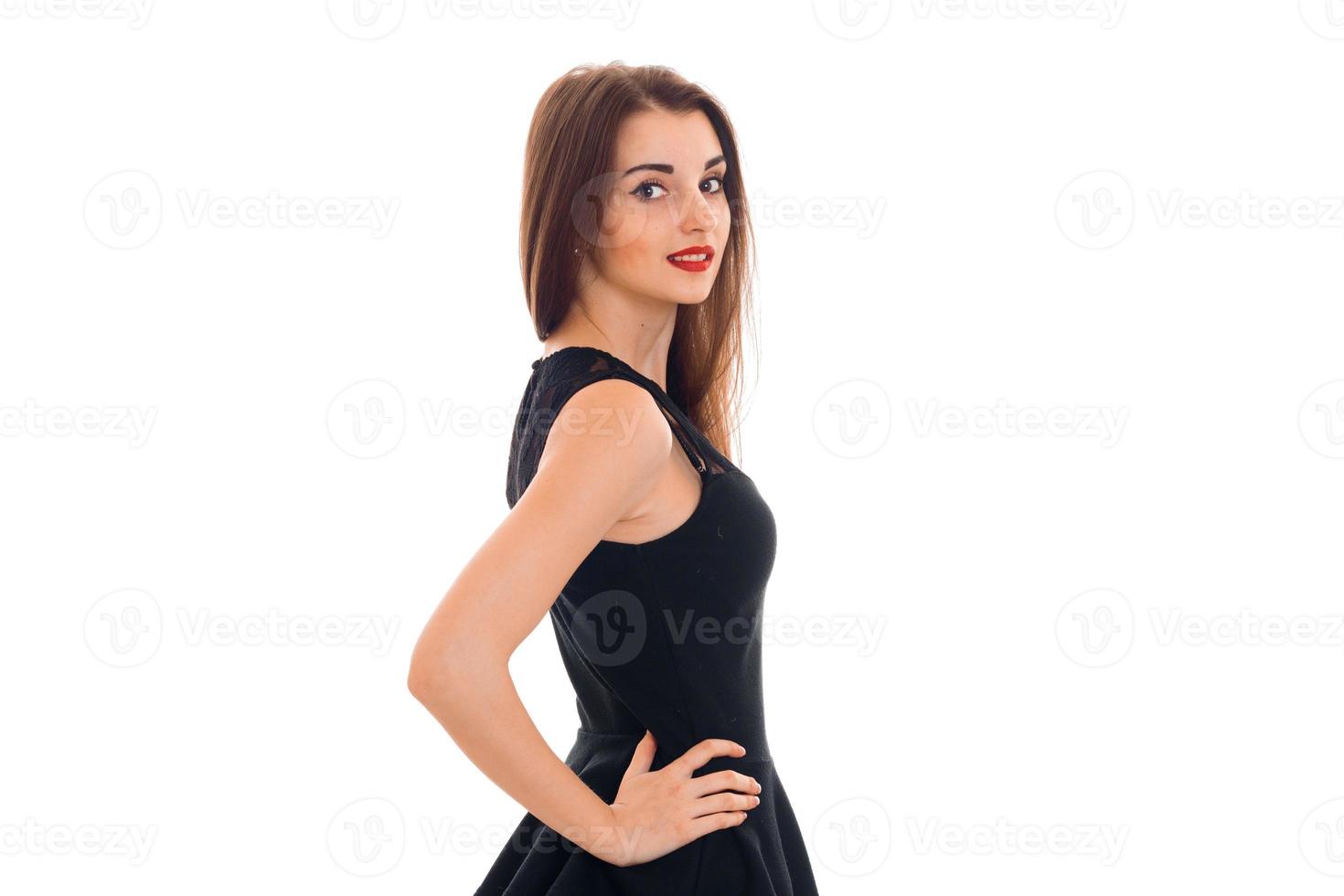 charming young woman with red lips posing and looking at the camera isolated on white background in studio photo