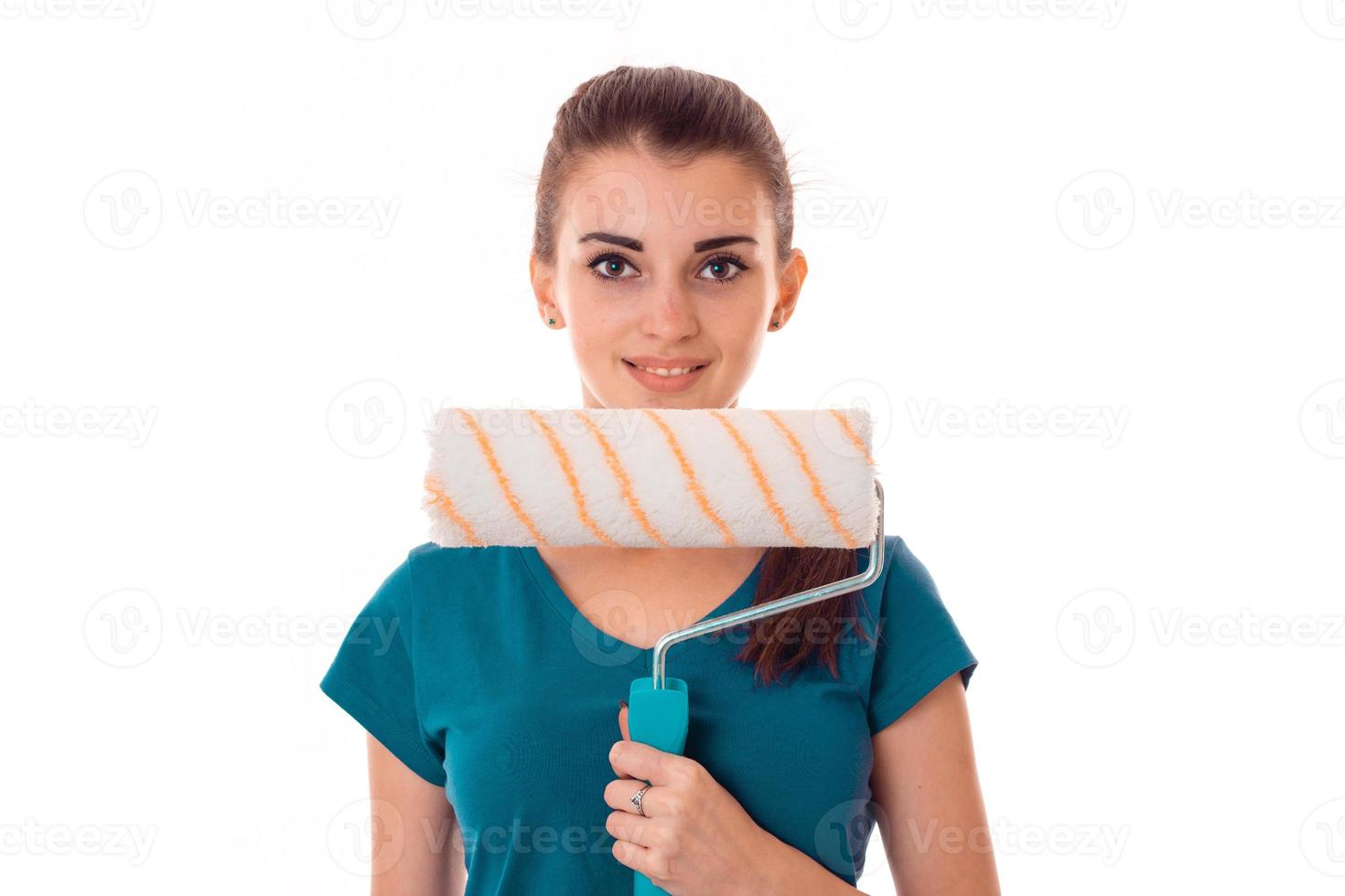 adorable brunette lady builder makes renovation isolated on white background photo