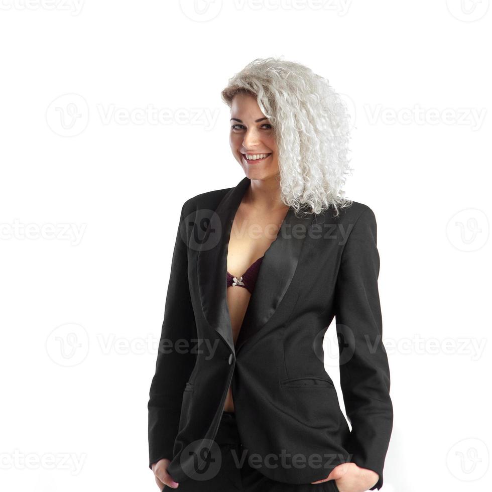 girl with curly hair smiling on camera photo