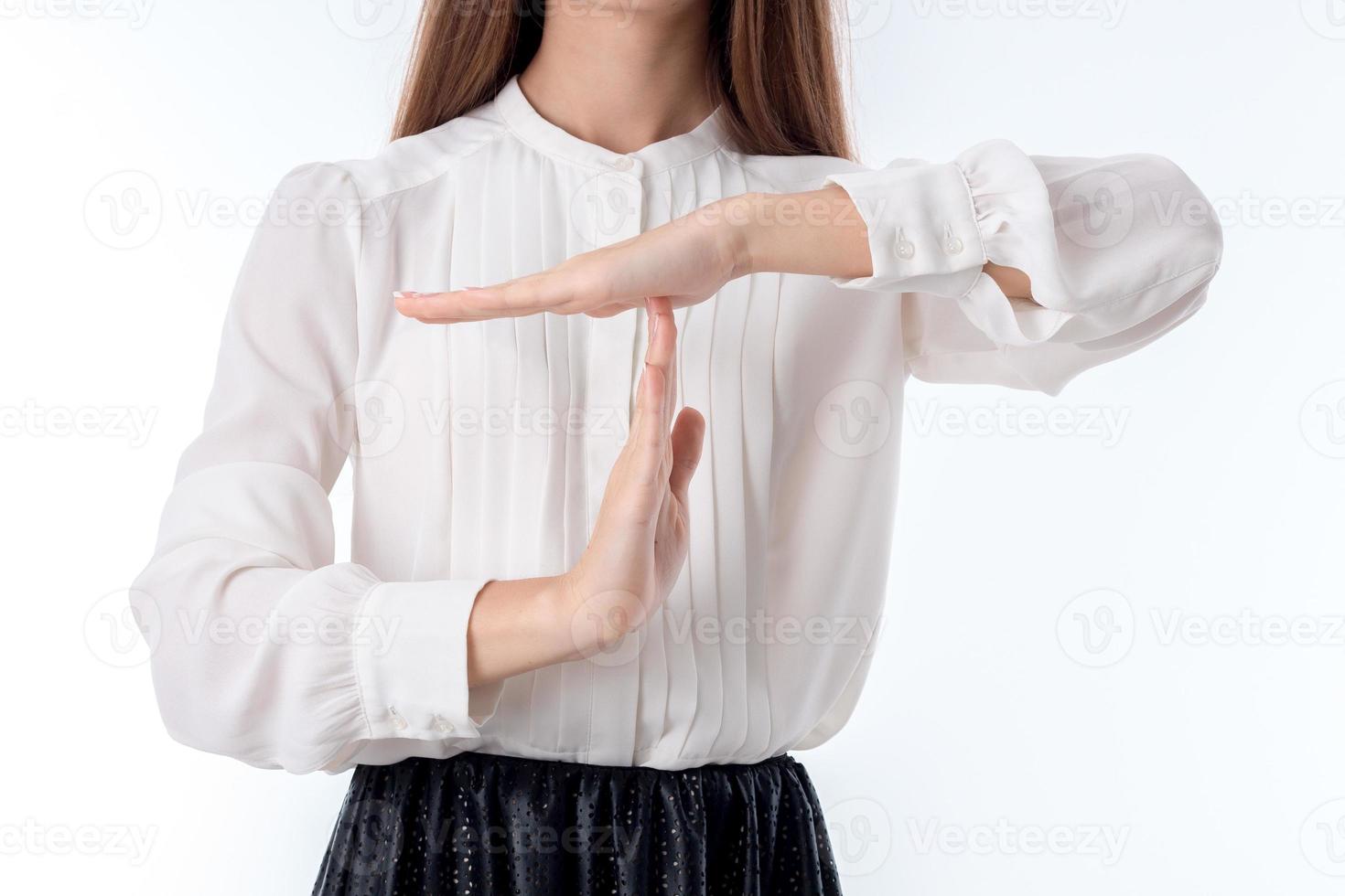 the girl in the white shirt has put his hand on top of another close-up photo