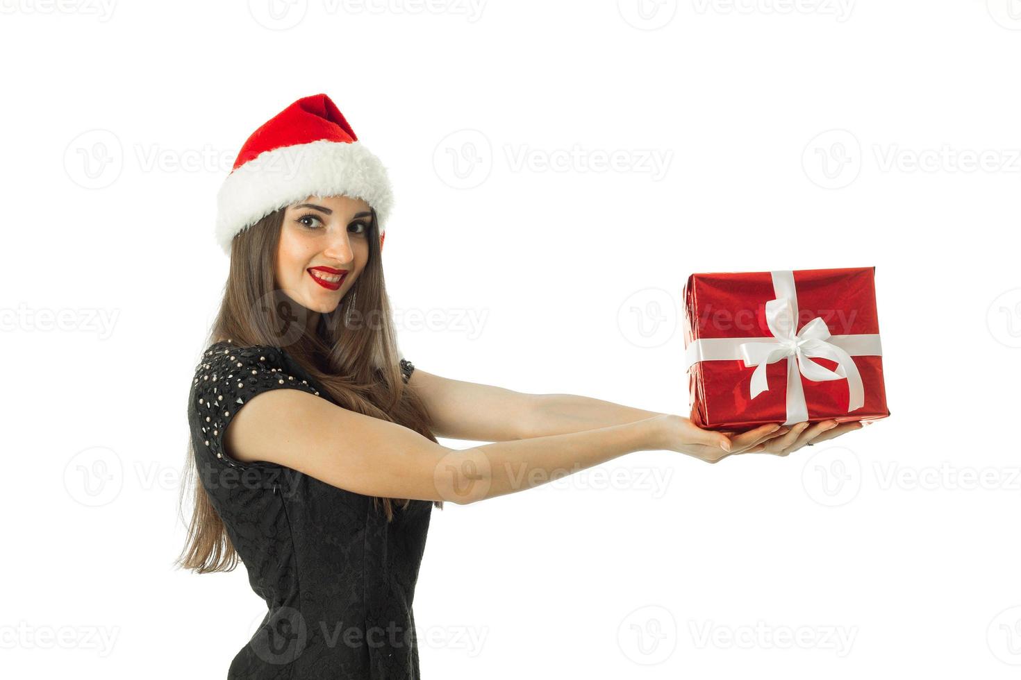 charming woman in santa hat smiling photo