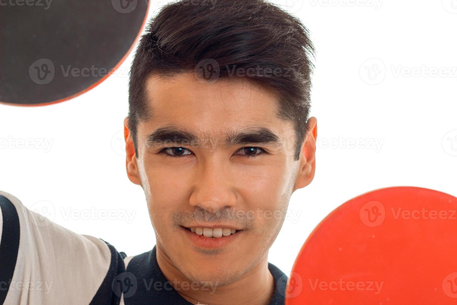 cheerful sportsman practicing ping-pong isolated on white background photo