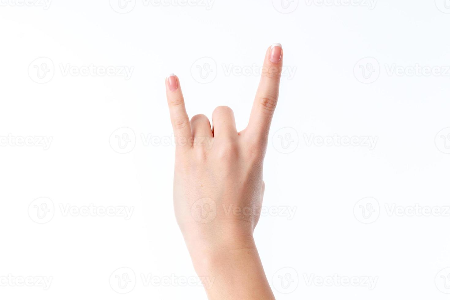 female hand showing the gesture with two fingers up podnjatyim isolated on white background photo