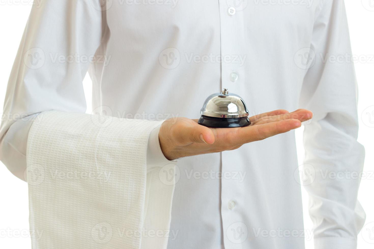 a close-up portrait of the bells in hand the waiter photo