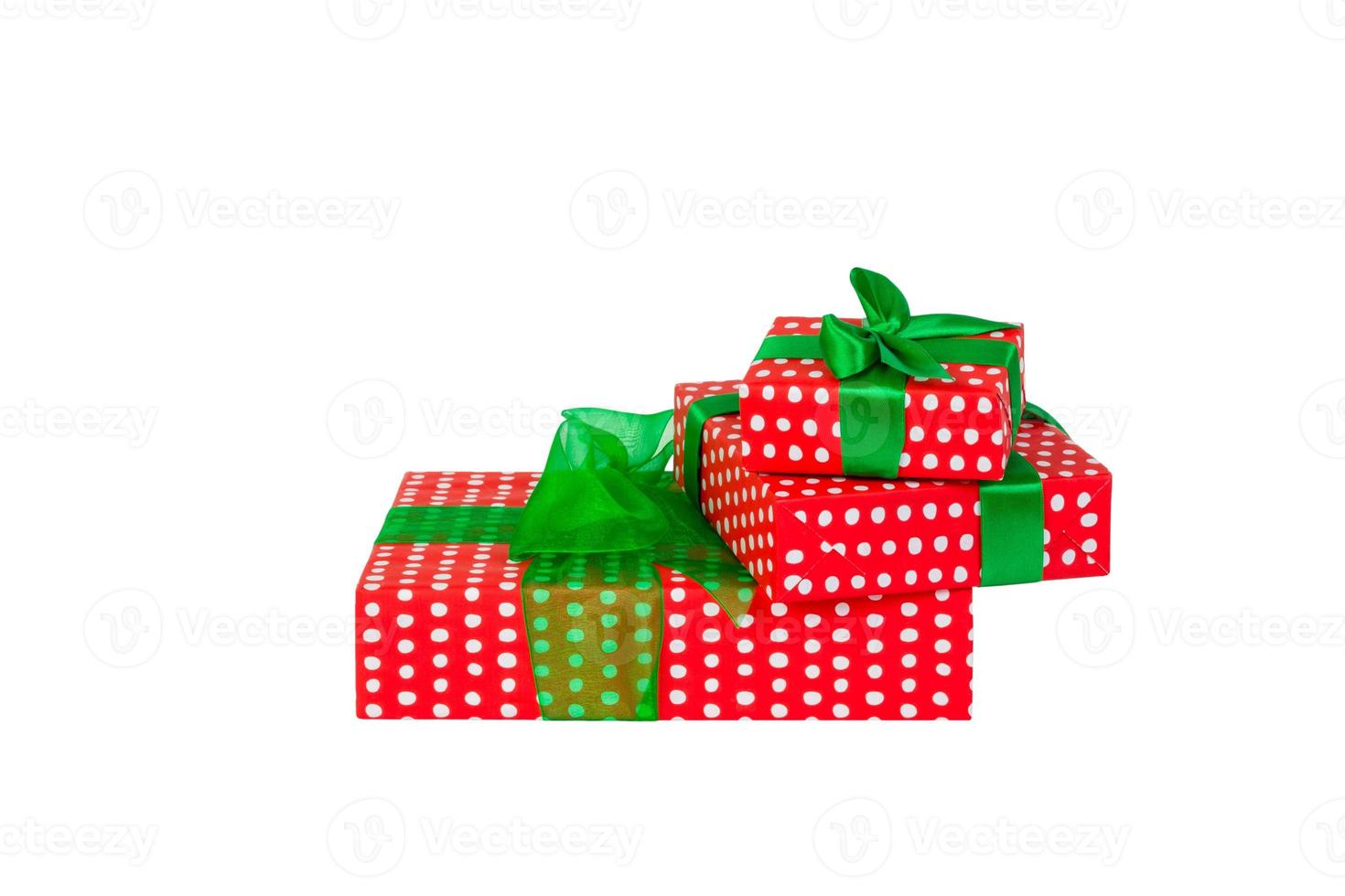 Set of Christmas or other holiday handmade present in red paper with Green ribbon. Isolated on white background, top view. thanksgiving Gift box concept photo