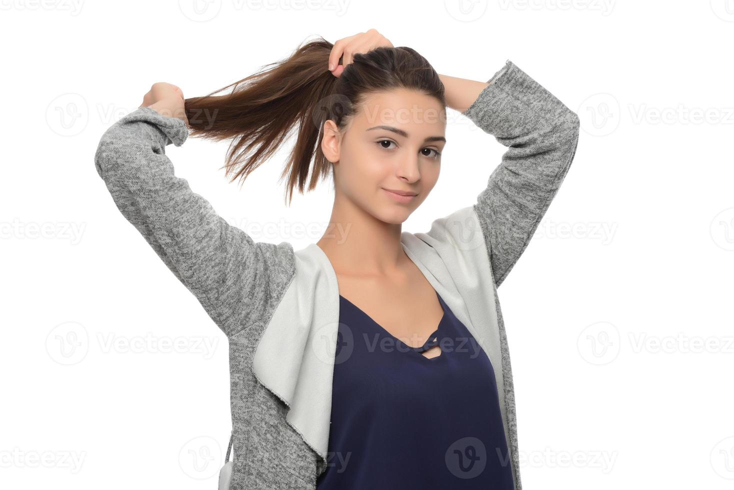 My hair regime has made my hair stronger. Studio shot of a young beautiful woman with long gorgeous hair posing photo