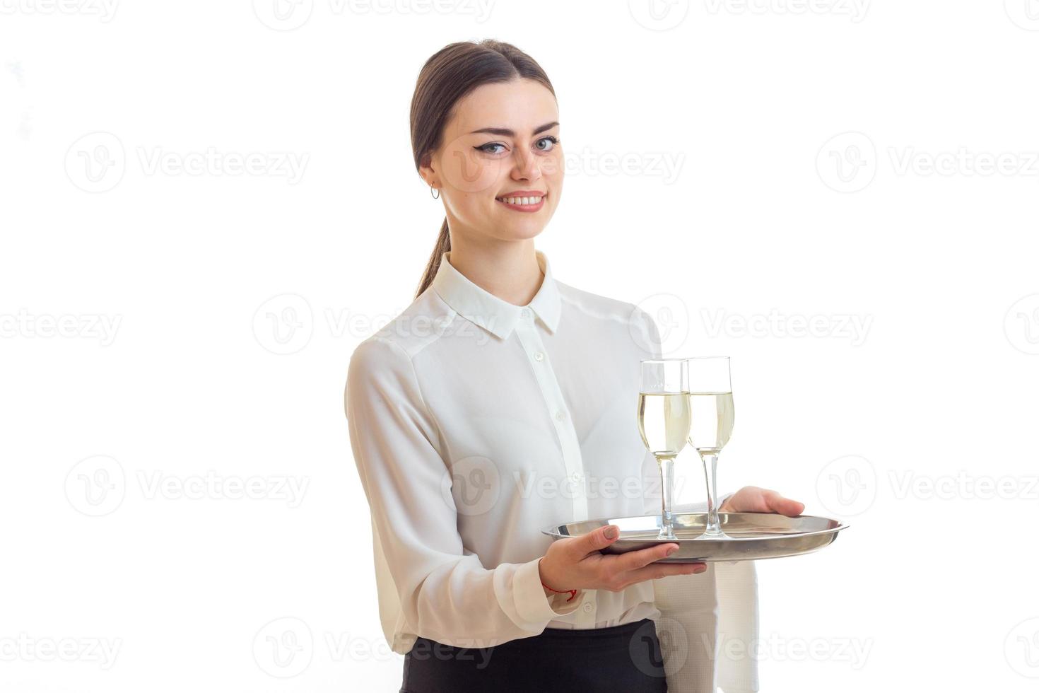 Cheerful girl waitress in uniform smiling photo