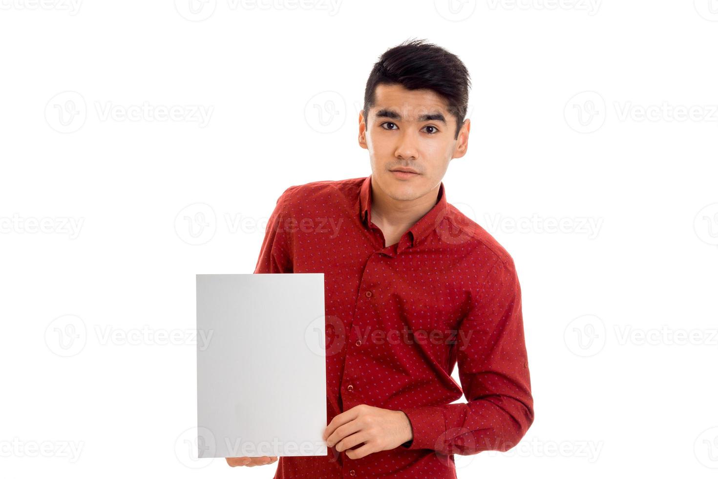 Young stylish elegance male model posing with placard in hands isolated on white background photo