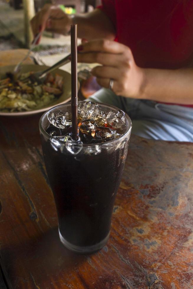 Cold drink in a glass at a restaurant. photo