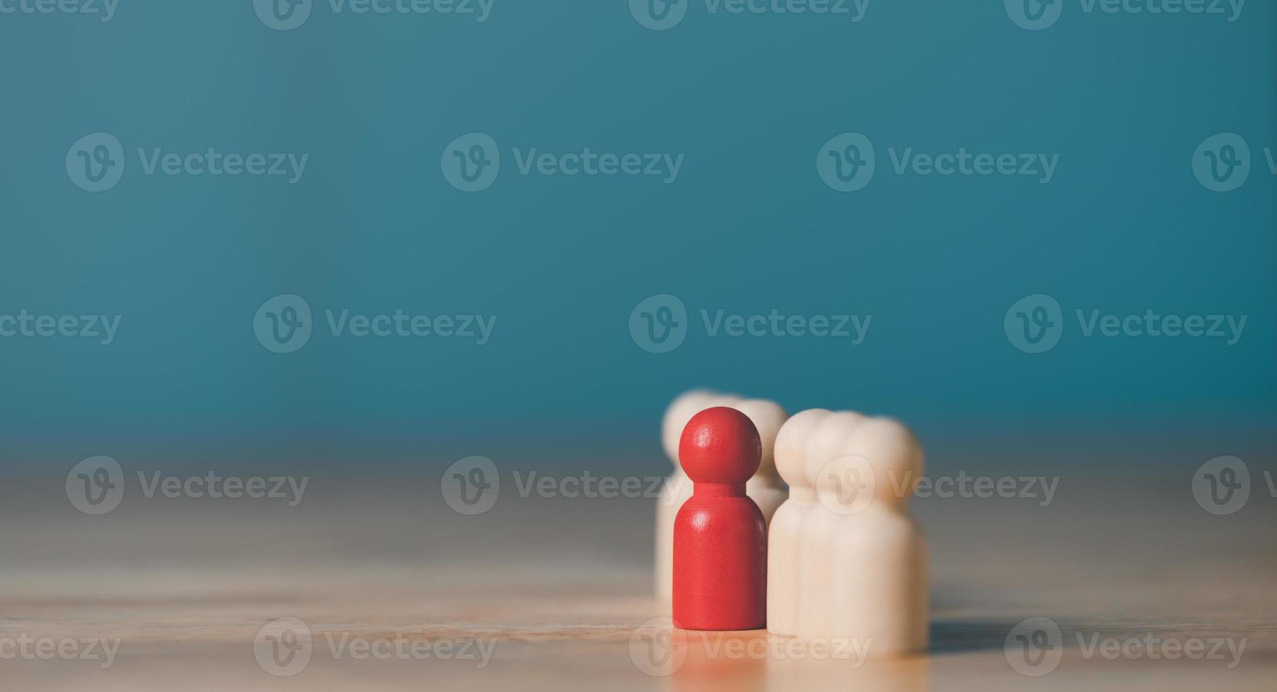 A wooden doll sits on the table,HRM or Human Resource Management,leadership in recruitment,Business development by choosing professional leaders employee competency teamwork,Taregt customer photo