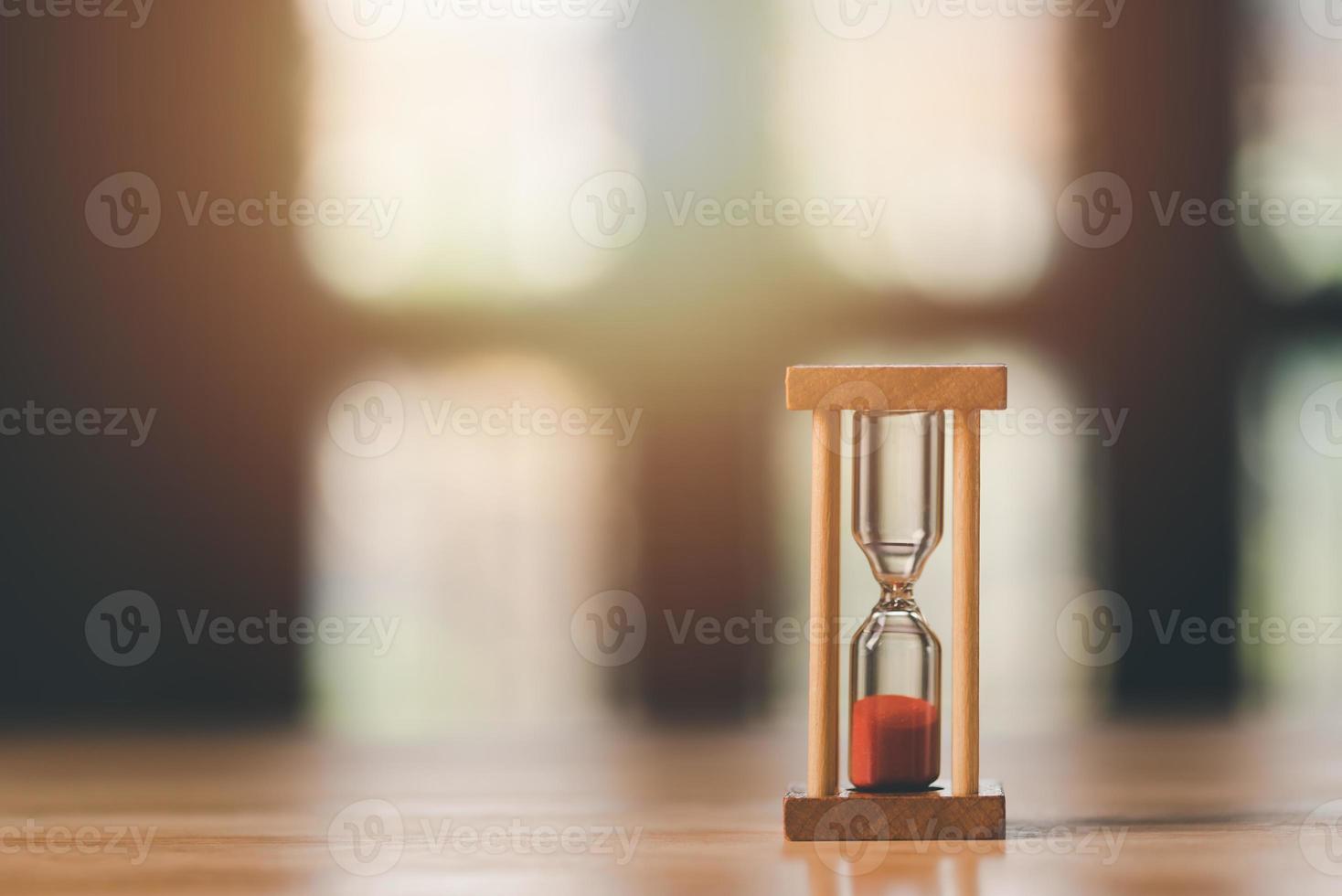 The hourglass is on the table, time management concept,effective business planning,time management in the organization,Agreement and solution,decision making schedule,end of the deal photo