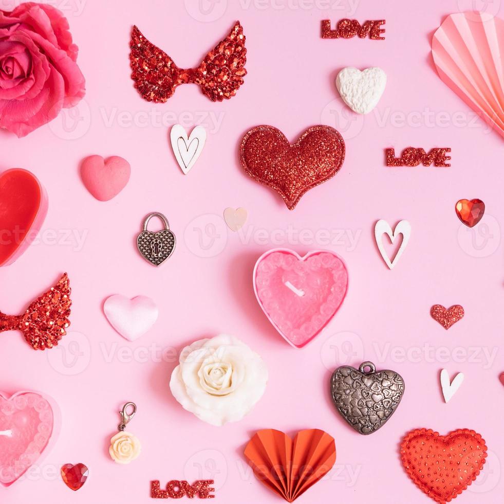 Pattern from hearts and valentines day symbols elements top view. Creative valentines day flat lay background photo