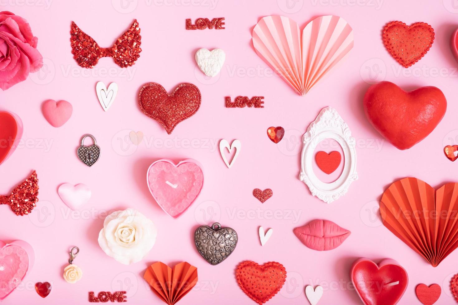 Many differente hearts and valentines day symbols elements top view. Creative valentines day flat lay background photo