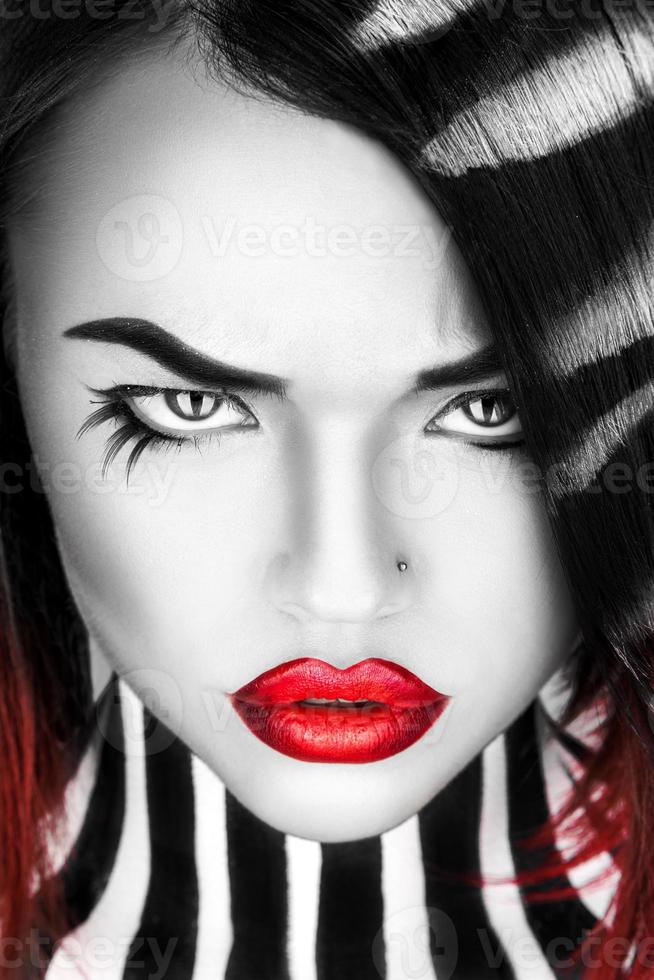 Black and white portrait of beauty woman with red lips photo