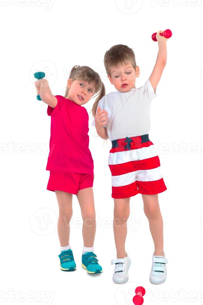 Young children with dumbbells photo