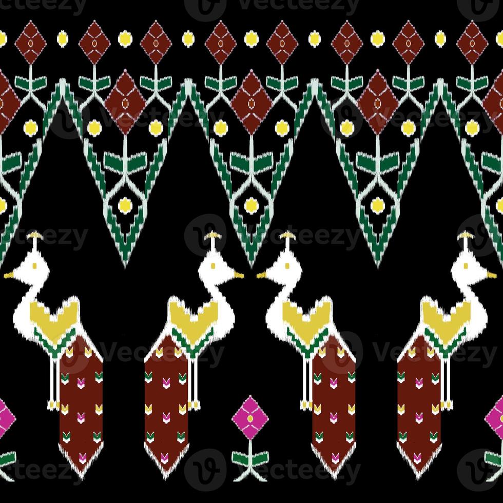 Beautiful colorful Thai knitted embroidery. geometric ethnic oriental pattern traditional on black background, Thai pattern culture with clipping path photo