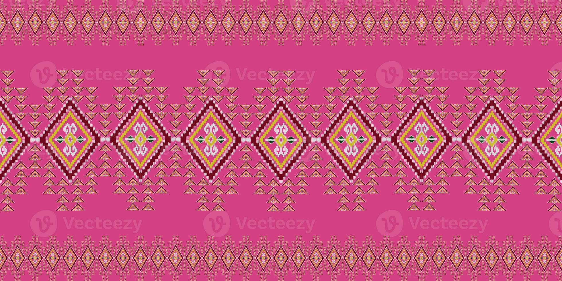 Beautiful colorful Thai knitted embroidery. geometric ethnic oriental pattern traditional on black background, Thai pattern culture with clipping path, pink style photo
