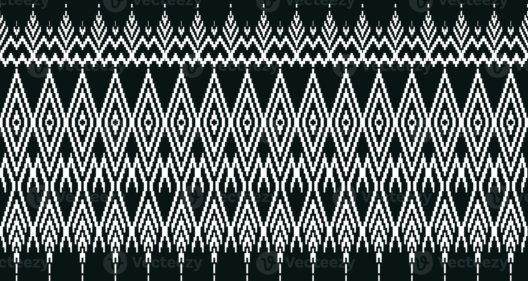 Beautiful black and whiteThai knitted embroidery . geometric ethnic oriental pattern traditional on black background, Thai pattern culture isolated with clipping path photo