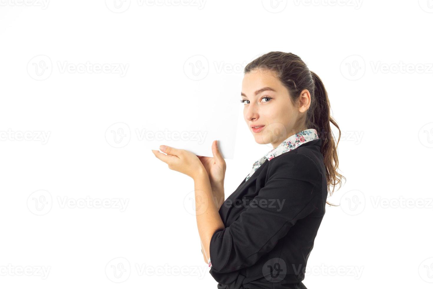 woman in uniform with white placard in hands photo