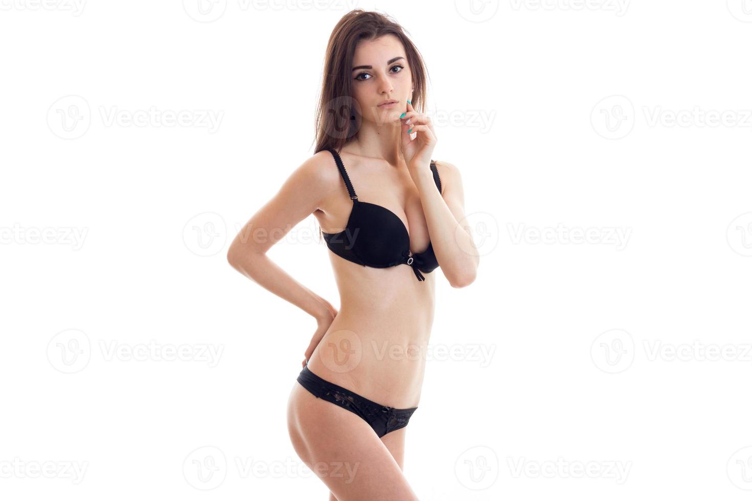 young sexy wonderful beautiful girl in black lingerie posing on camera photo