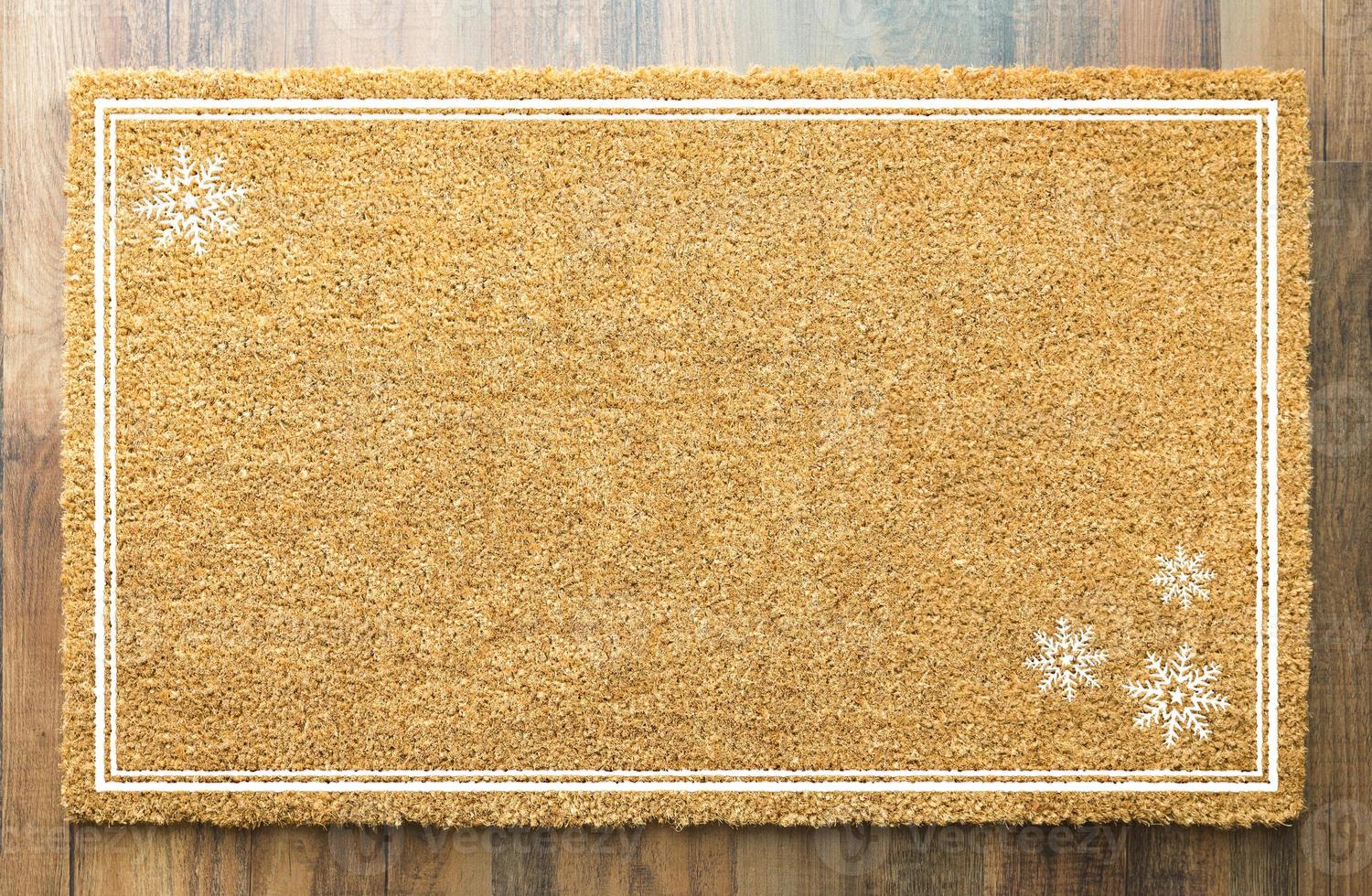Blank Holiday Welcome Mat With Snow Flakes On Wood Floor Background photo