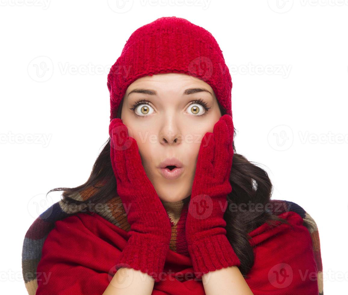 Stunned Mixed Race Woman Wearing Winter Hat and Gloves photo