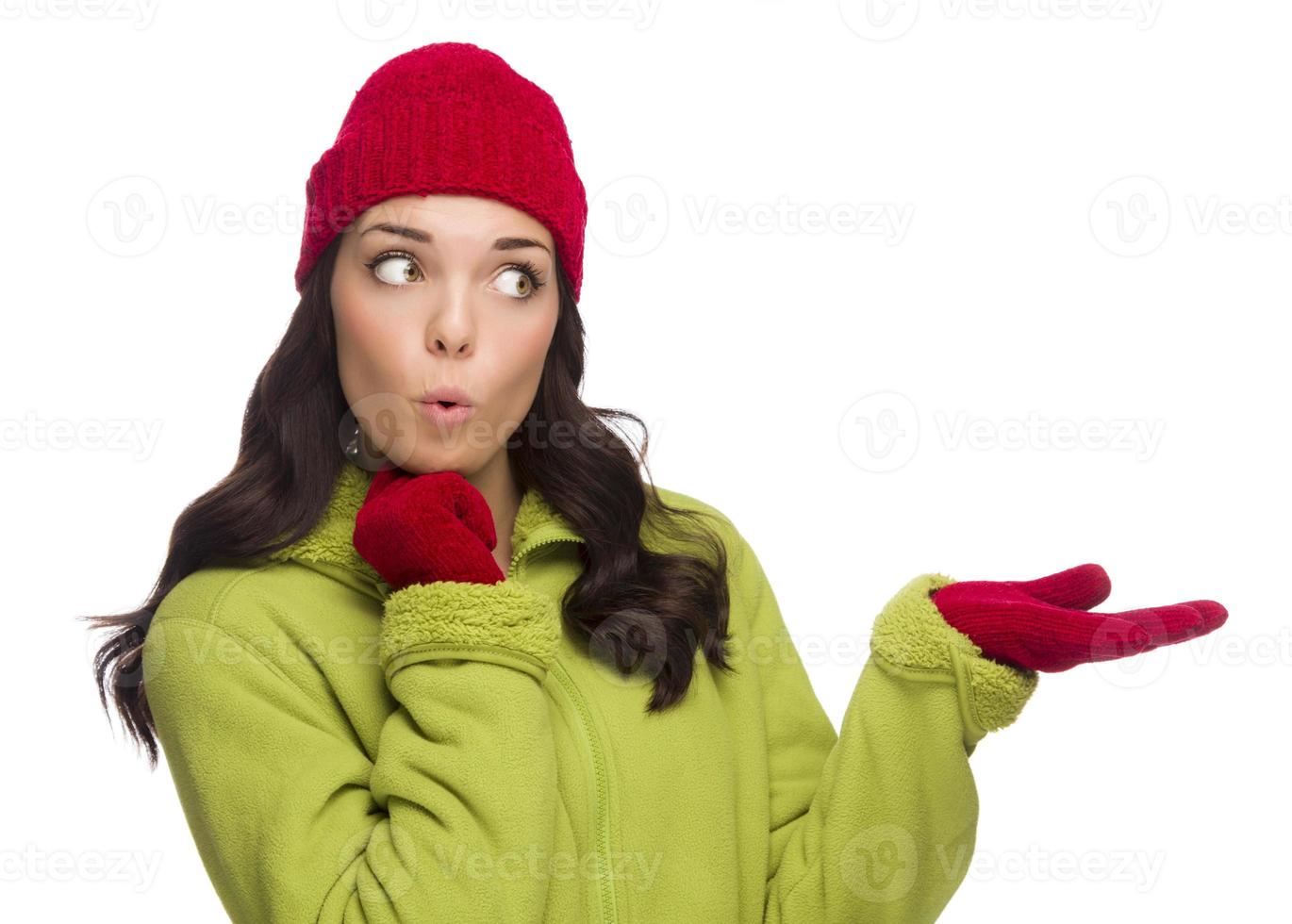 Mixed Race Woman Wearing Hat and Gloves Gesturing to Side photo