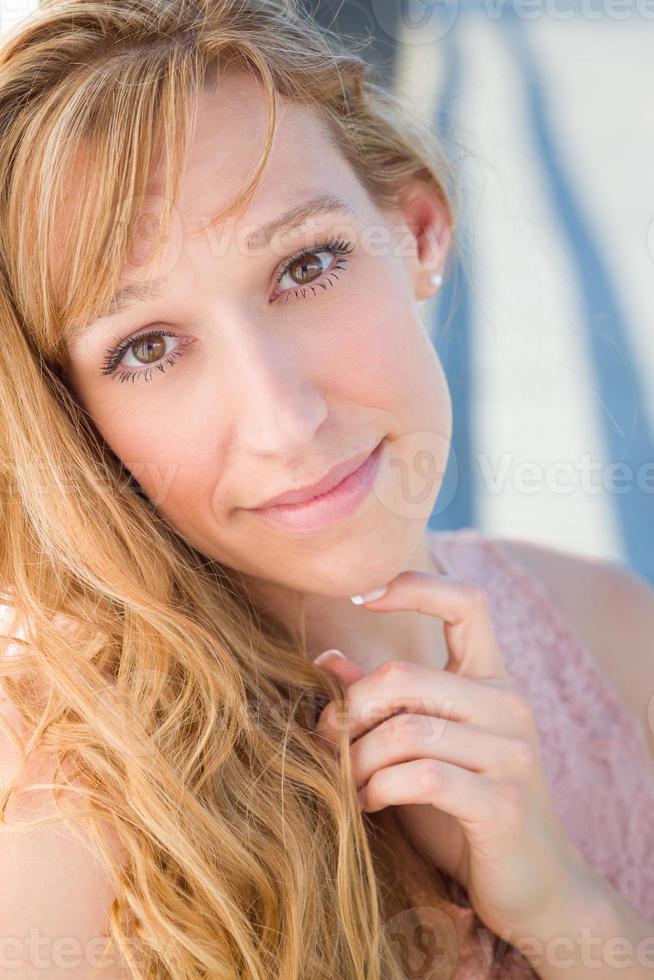 Outdoor Portrait of Young Adult Brown Eyed Woman. photo