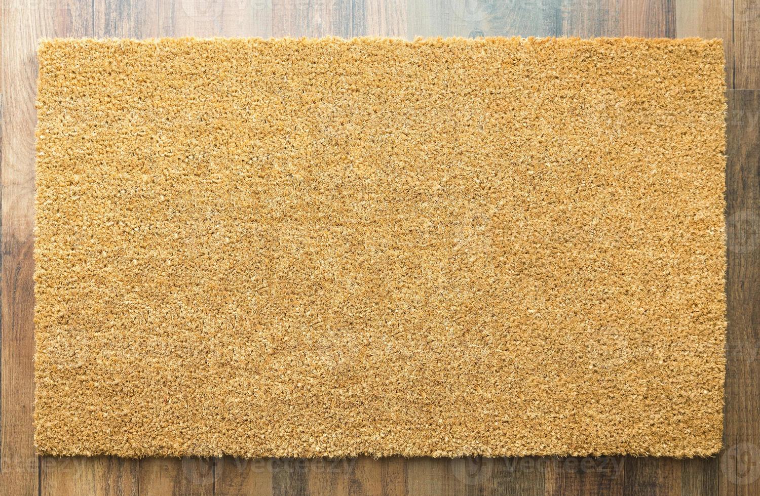 Blank Welcome Mat On Wood Floor photo
