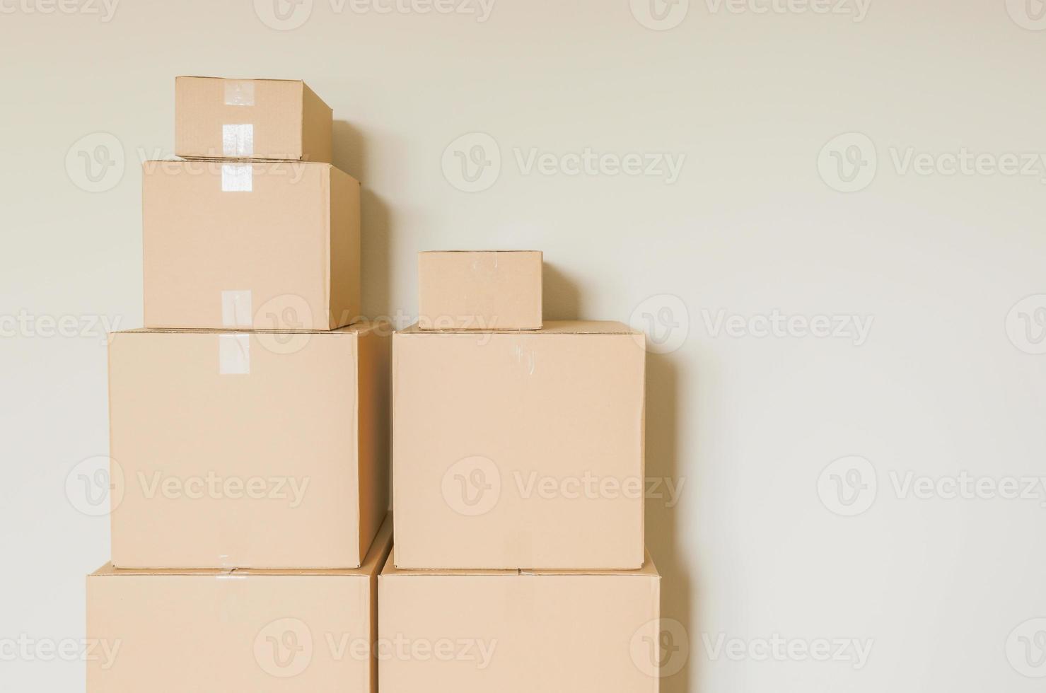 Packed Moving Boxes In Empty Room photo