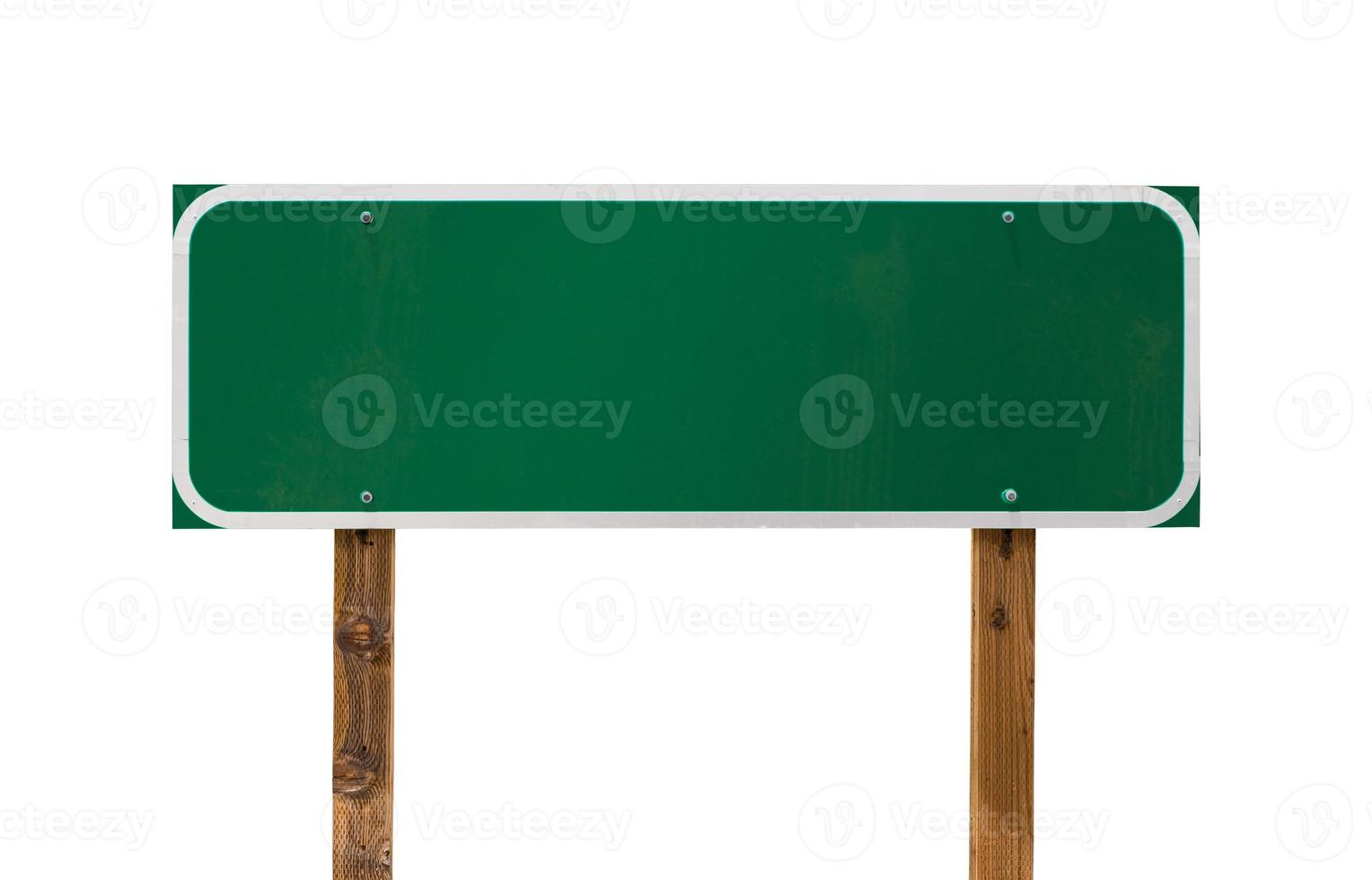 Blank Green Road Sign with Wooden Posts Isolated on a White Background photo