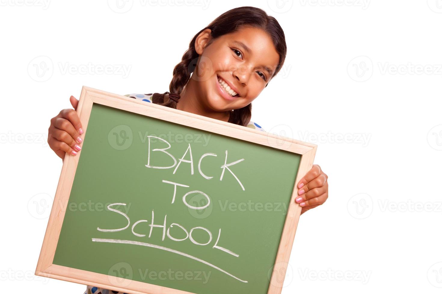 Pretty Hispanic Girl Holding Chalkboard with Back To School photo