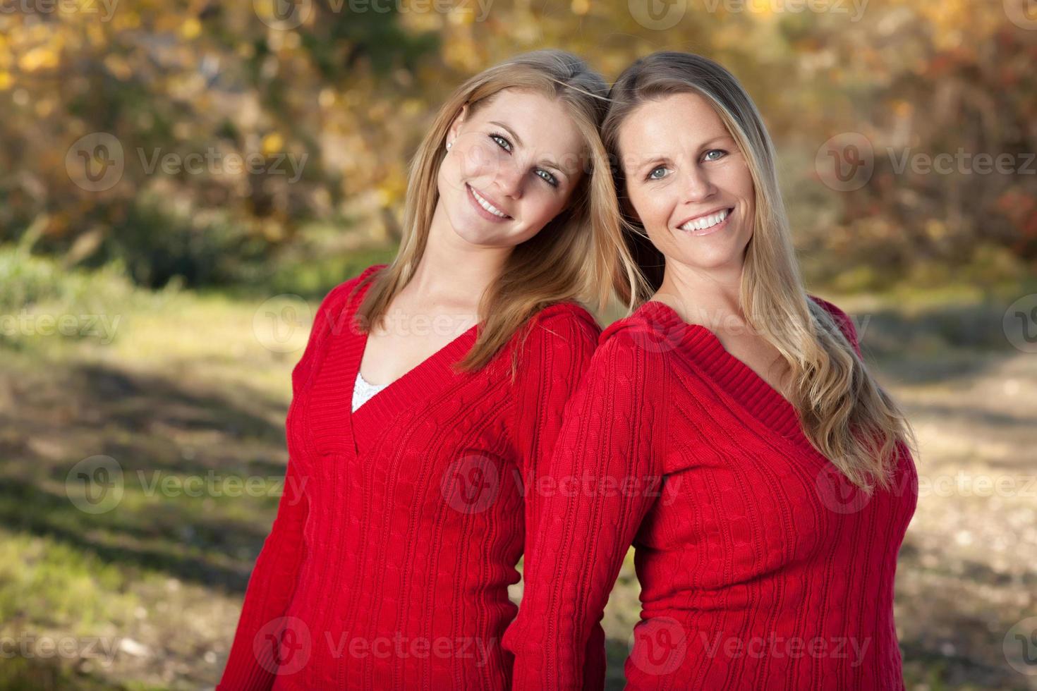 Pretty Mother and Daughter Portrait in Park photo