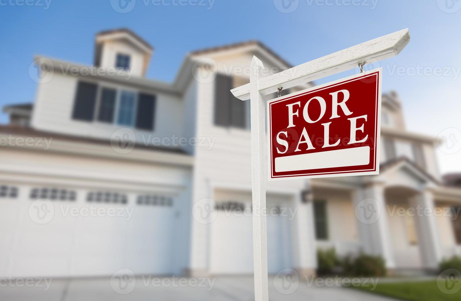 Home For Sale Sign in Front of New House photo