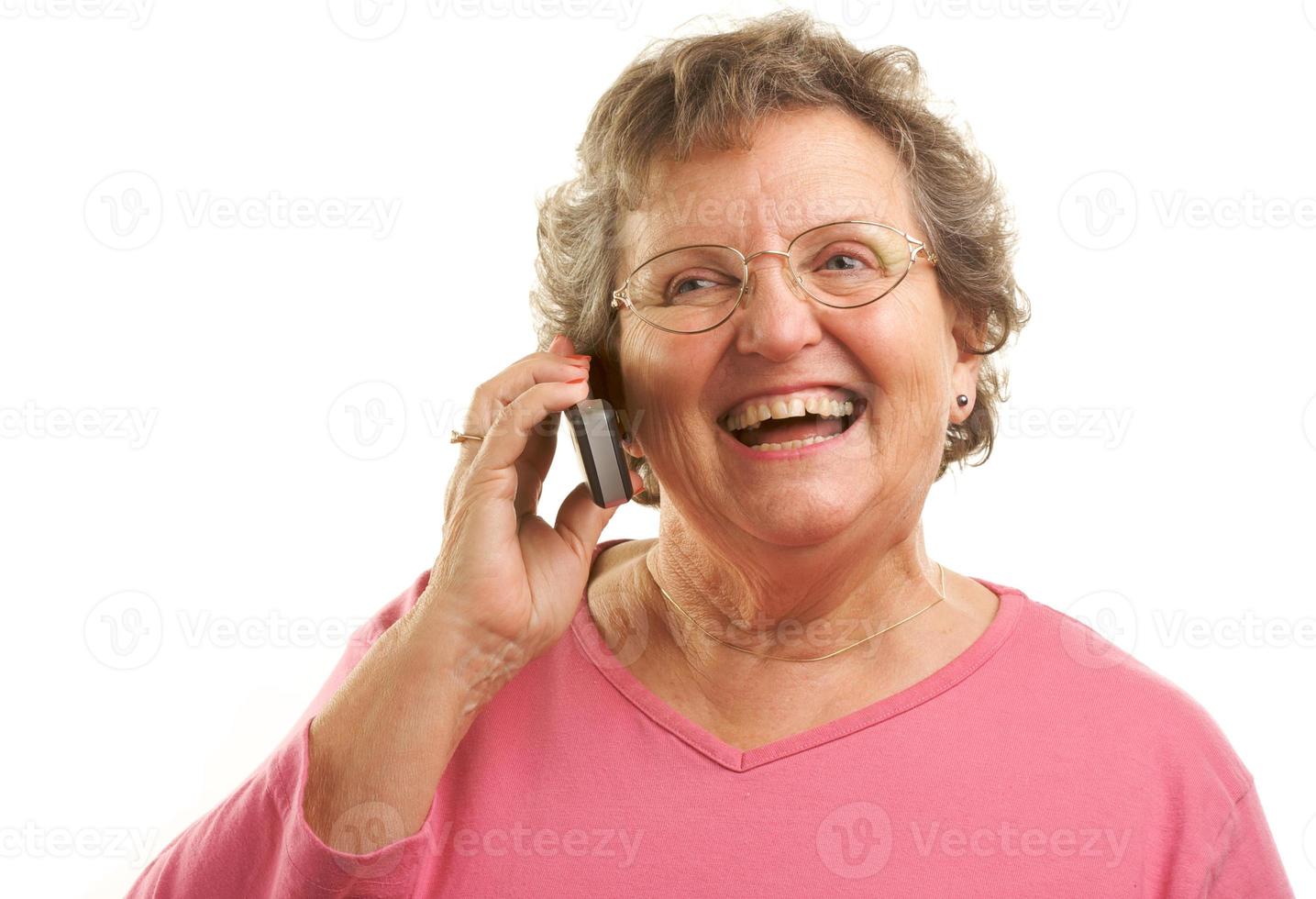 Senior Woman Using Cell Phone photo