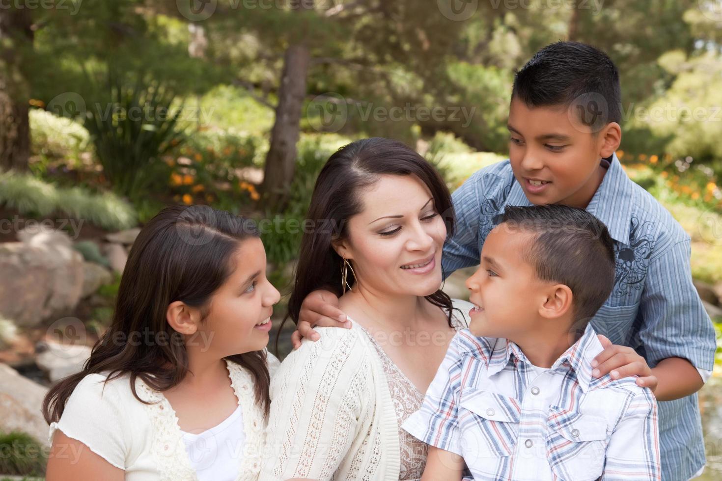 Happy Mother and Children in the Park photo